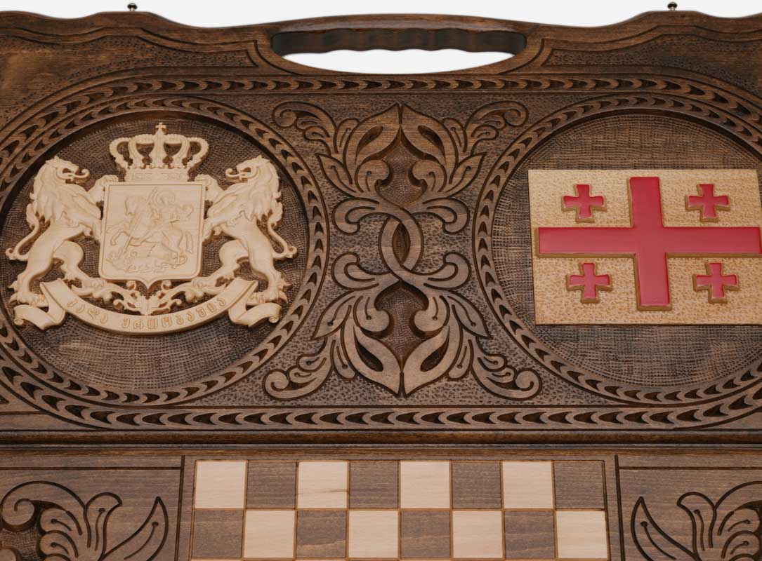 Close-up of the coat of arms of Georgia with its flanking lions and crown