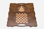 The cut-out carry handle and the upper carving of the lid
