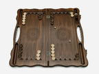 Angled view of the handmade Georgian backgammon set showing the carved lid