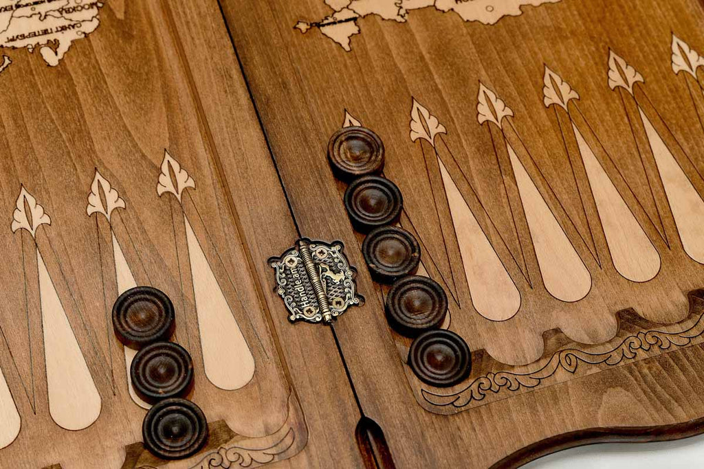 Angled view of the handmade Russian backgammon set showing both emblems on the lid