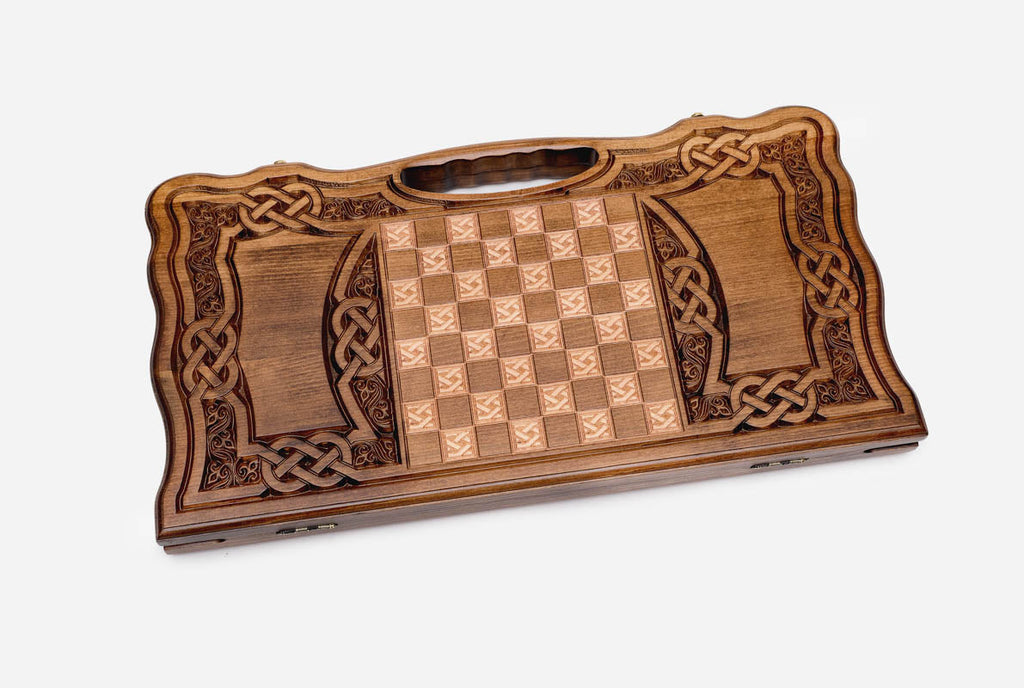 Side view of the folded board showing its bronze hinges and clasps