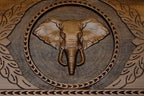The cut-out carry handle and the upper carving of the lid