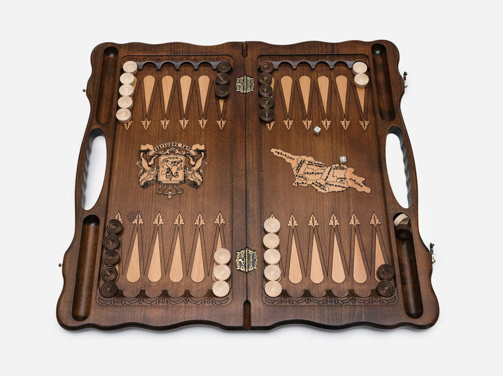 The cut-out carry handle and the upper carving of the lid