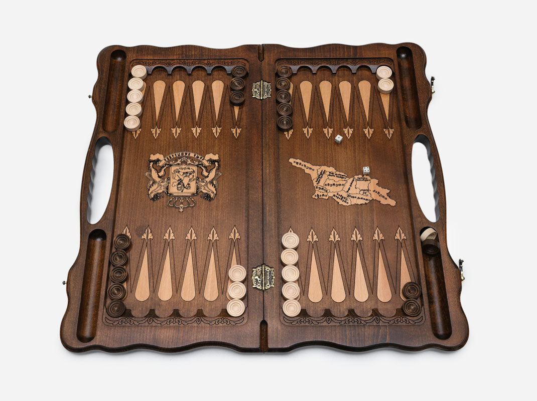 Side view of the folded board showing its bronze hinges and clasps