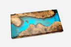 Overhead view of the turquoise river epoxy backgammon board