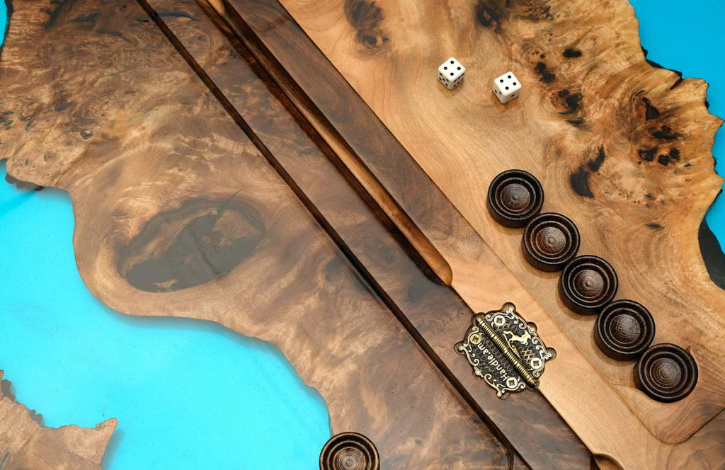Close-up of the translucent turquoise epoxy and figured walnut edges