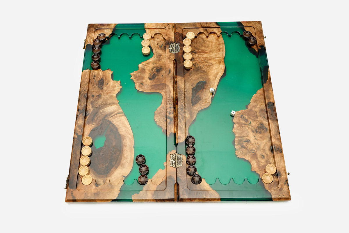 Close-up of the translucent emerald epoxy river and walnut wood edges