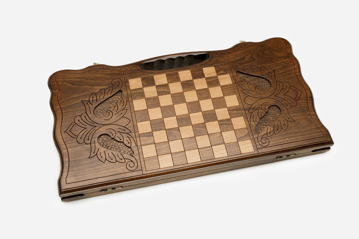 Side view of the folded board showing its bronze hinges and clasps