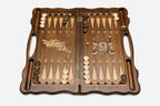 The cut-out carry handle and the upper carving of the lid