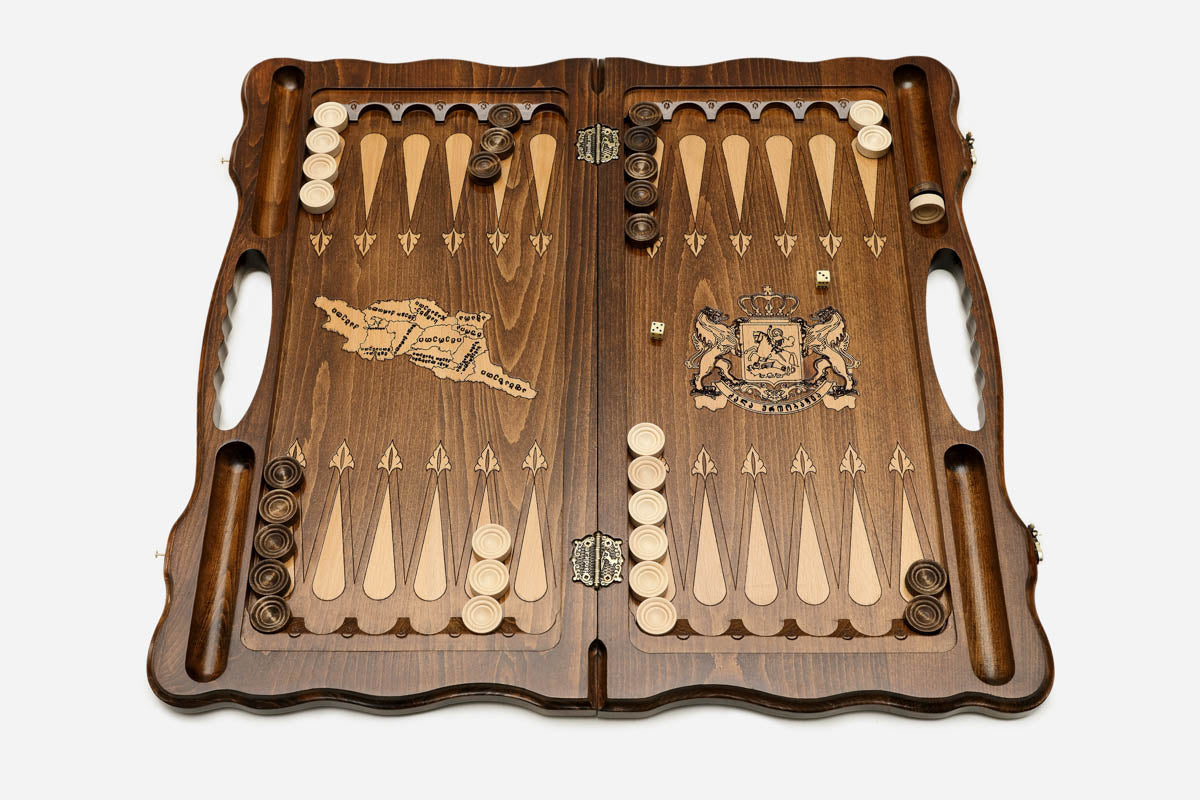 The cut-out carry handle and the upper carving of the lid