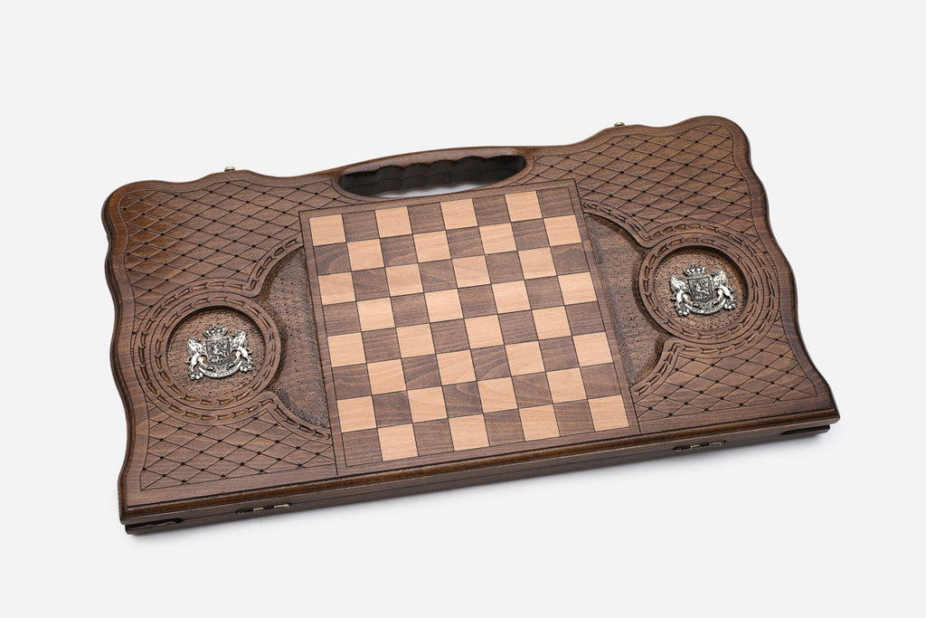 Side view of the folded board showing its bronze hinges and clasps
