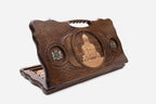 Carved Georgian backgammon board with the Sameba Cathedral, bronze roundels and a cut-out carry handle, propped open