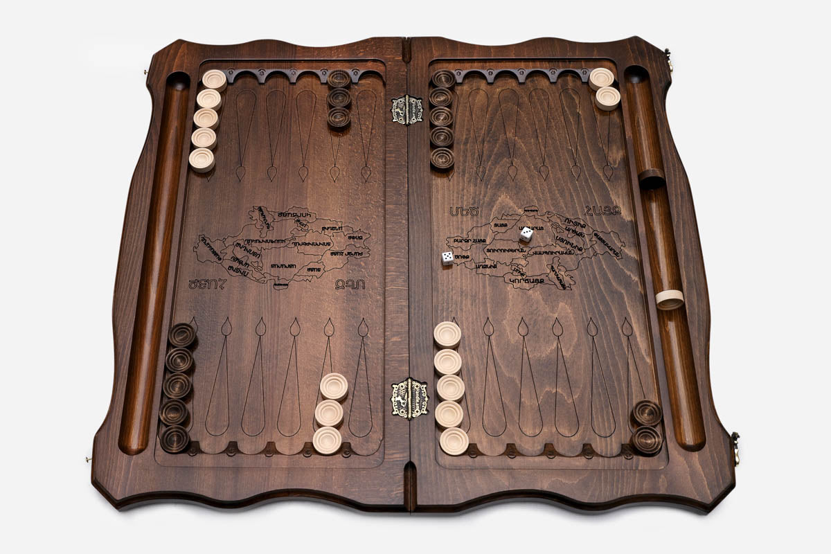 Beech and walnut checkers with dice on the nardi field