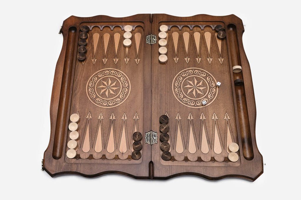 Flying eagle with spread wings hand-carved in wood - backgammon board detail