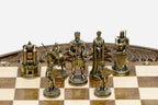 Close-up of the gilded brass Crusader king, queen and mounted knights