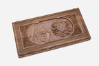 Angled view of the luxury walnut backgammon set showing the carved alphabet