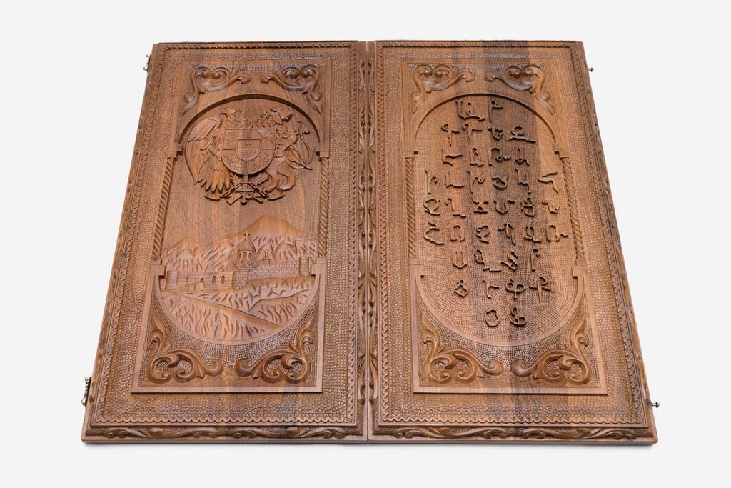 Detail of the alphabet relief and its carved border