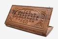 Master-carved walnut Armenian backgammon board with the complete alphabet in deep relief, propped open