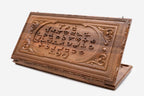 Master-carved walnut Armenian backgammon board with the complete alphabet in deep relief, propped open