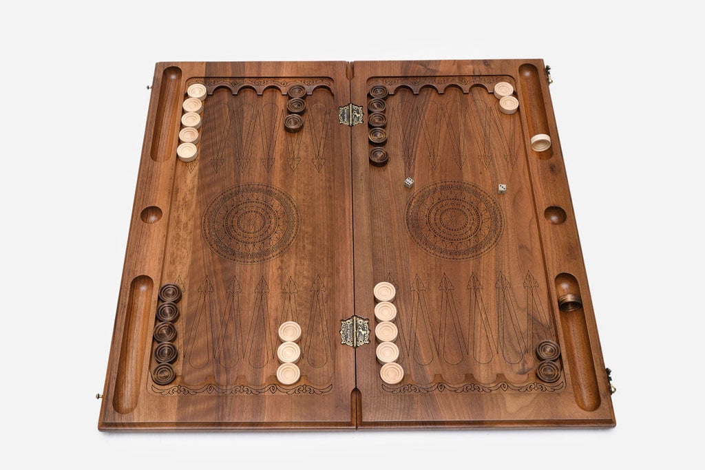 The walnut board folded shut on its clasps