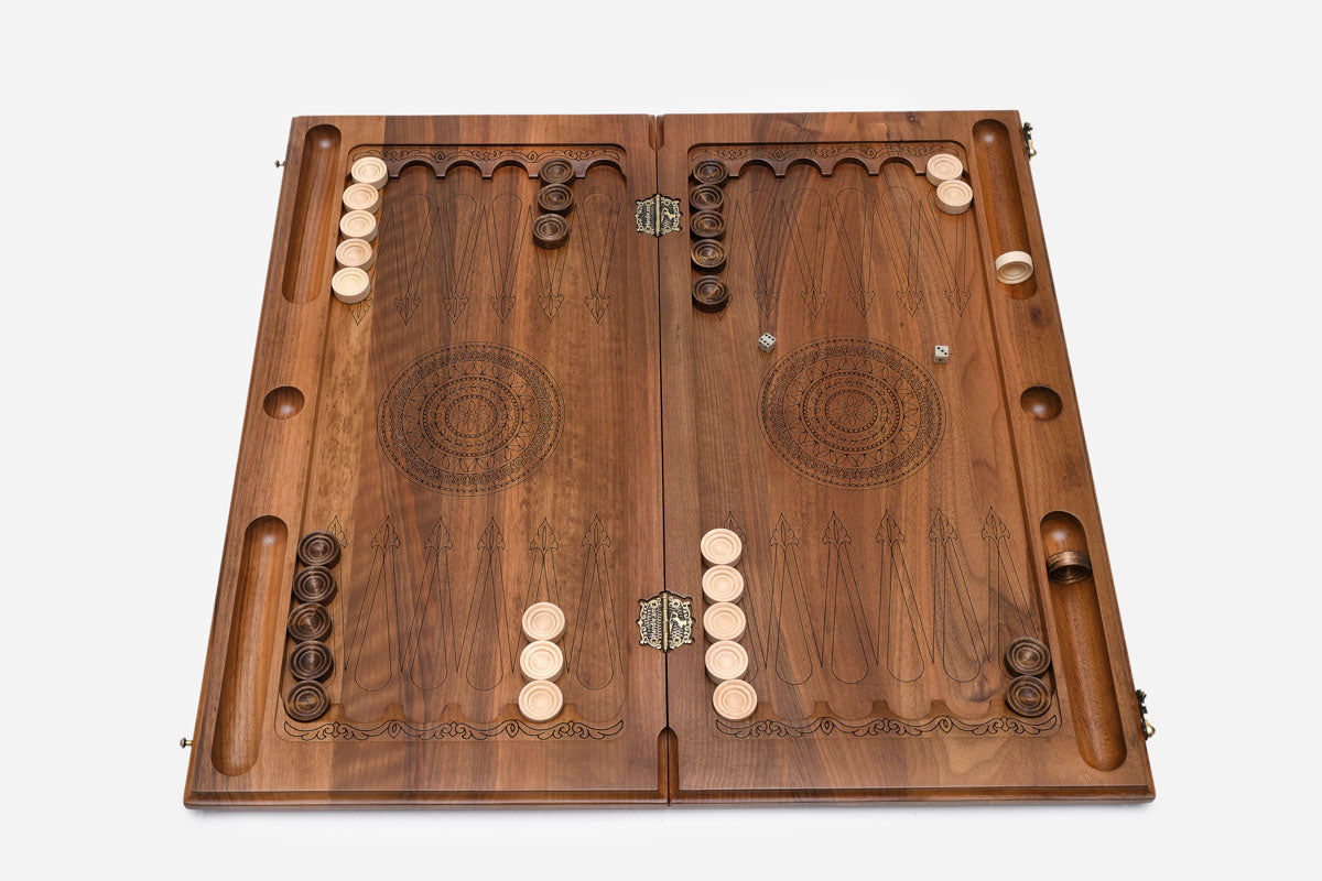 The walnut board folded shut on its clasps