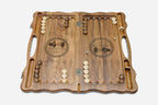 Side view of the folded walnut board showing its bronze hinges