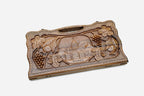 Angled view of the luxury walnut backgammon set showing the carved lid