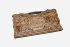 Angled view of the luxury walnut backgammon set showing the carved lid