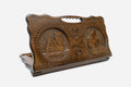 Carved Armenian backgammon board with two landmarks of Artsakh and a cut-out carry handle, propped open