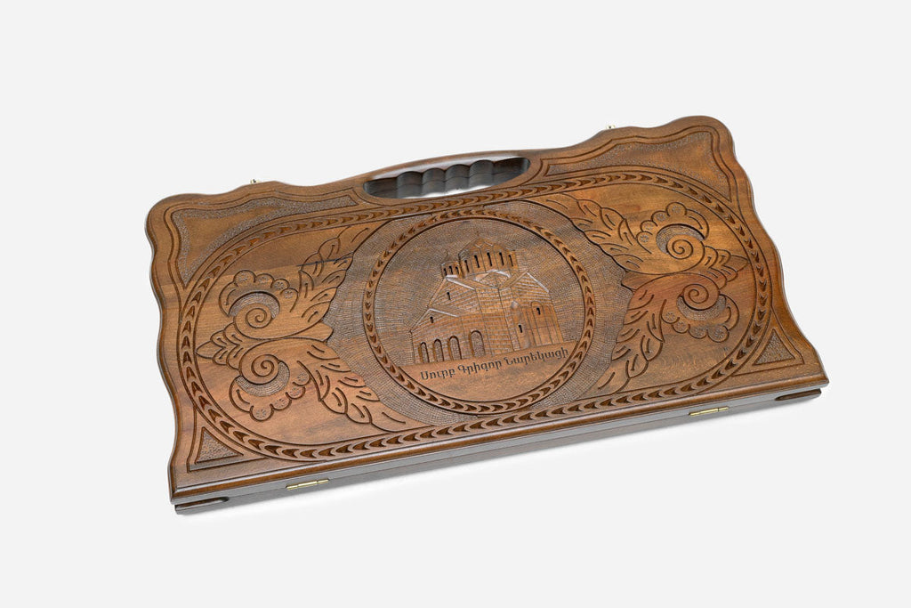 Angled view of the handmade Armenian backgammon set showing the carved lid