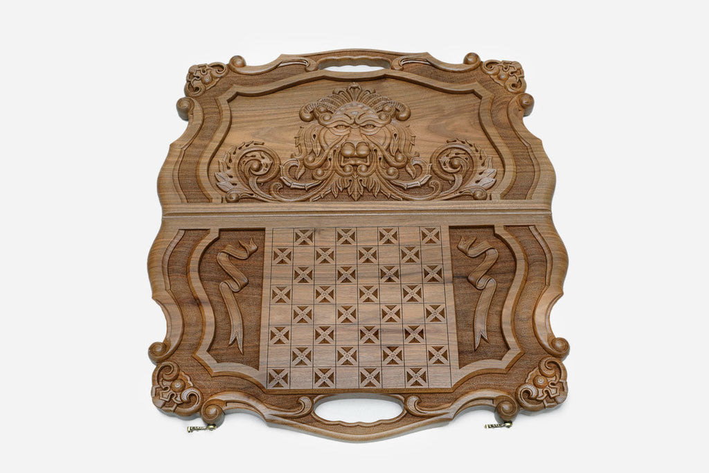 Detail of the ornate carved scrollwork cartouche around the lion