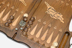 Side view of the folded board showing its bronze hinges and clasps