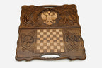 The cut-out carry handle and the upper carving of the lid