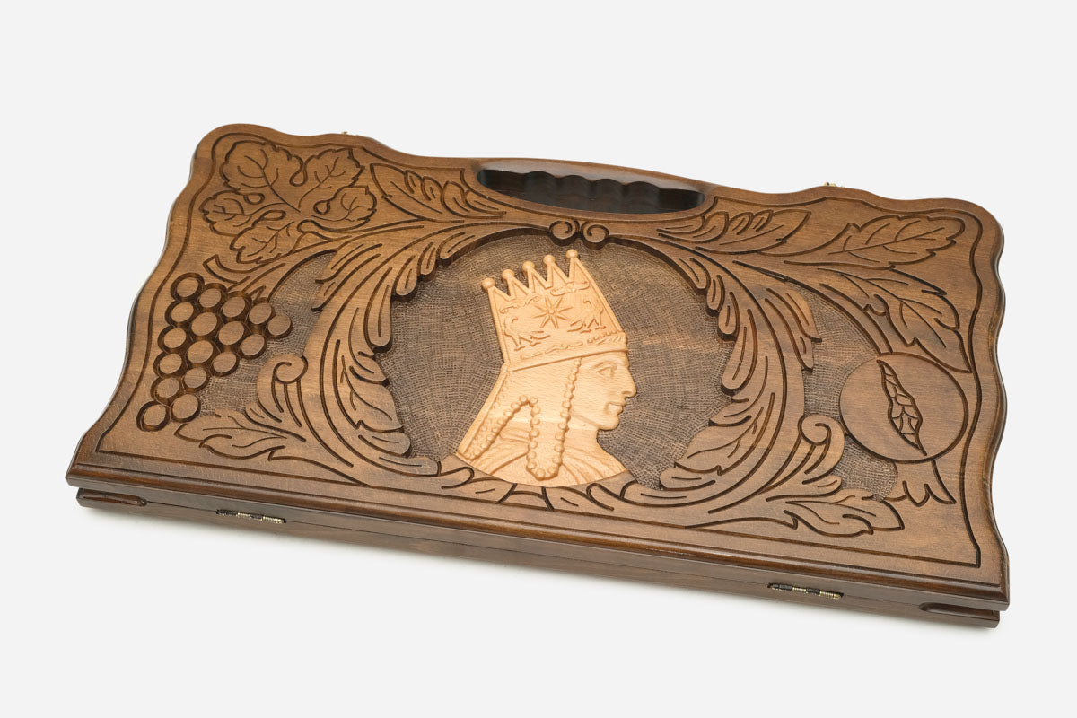 Angled view of the handmade Armenian backgammon set showing the carved lid