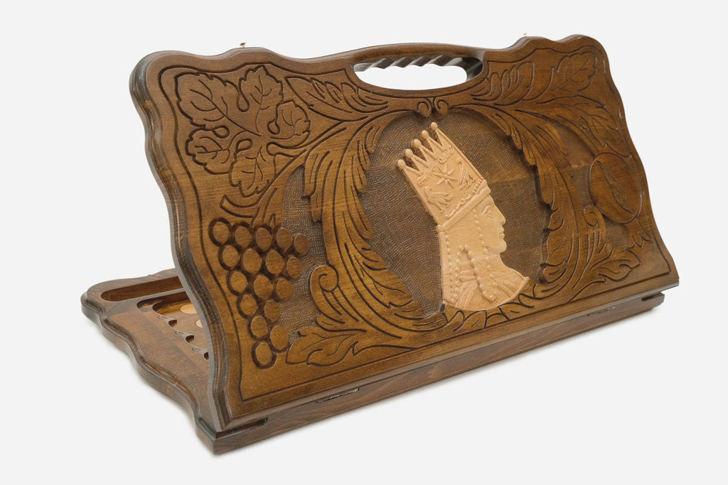 Carved Armenian backgammon board with Tigran the Great crowned in profile, cut-out carry handle, propped open