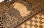 The cut-out carry handle and the upper carving of the lid