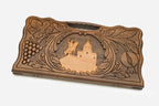 Angled view of the handmade Georgian backgammon set showing the carved lid