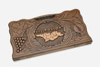 Angled view of the handmade Georgian backgammon set showing the carved lid