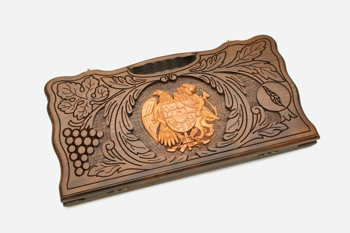 Angled view of the handmade Armenian backgammon set showing the carved lid