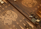 Side view of the folded board showing its bronze hinges and clasps