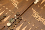 Side view of the folded board showing its bronze hinges and clasps