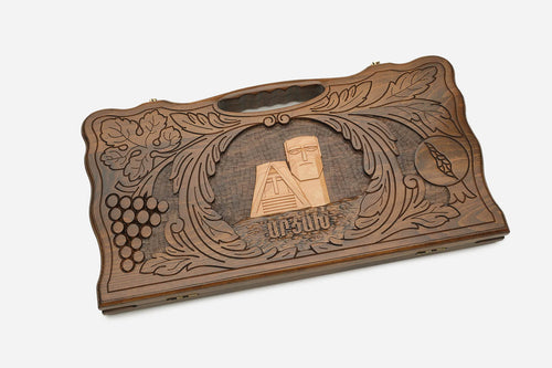 Angled view of the handmade Armenian backgammon set showing the carved lid