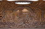 The cut-out carry handle and the upper carving of the lid