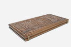 Whole surface hand-carved in flowing ornament - walnut backgammon board detail