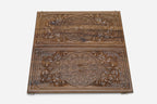 Carved ornament backgammon set shown folded with bronze hinges and clasps