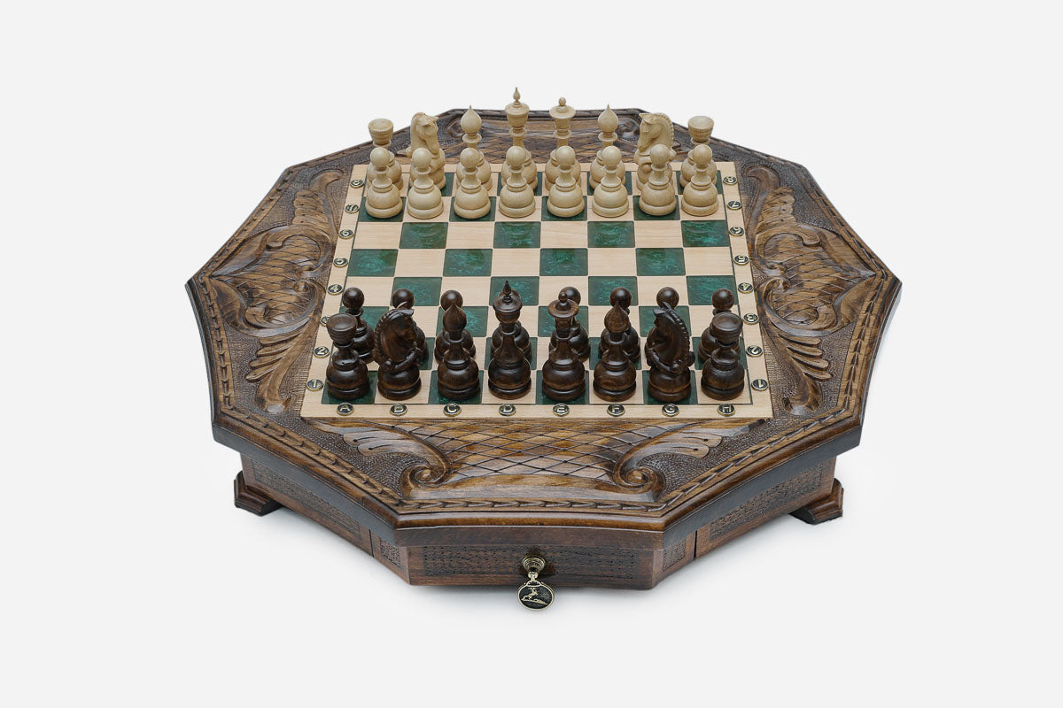 Octagonal chess set with storage, emerald-green epoxy squares and turned wooden pieces set up for play
