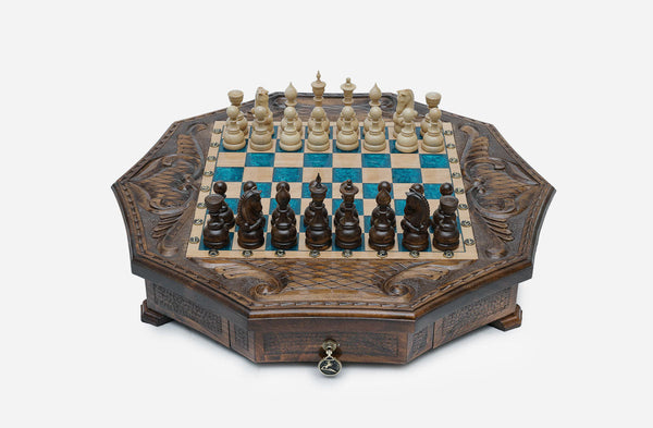 Octagonal chess set with storage, turquoise-blue epoxy squares and turned wooden pieces set up for play