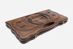 Close-up of the church carved in relief inside its oval frame