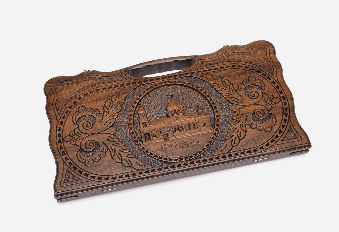 Angled view of the handmade Armenian backgammon set showing the carved lid