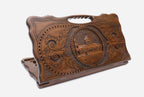 Carved Armenian backgammon board with the Holy Mother of God Cathedral of Gyumri and a cut-out carry handle, propped open